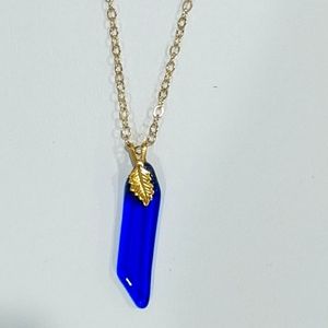 Artisan Handmade blue glass drop necklace with gold leaf finding.